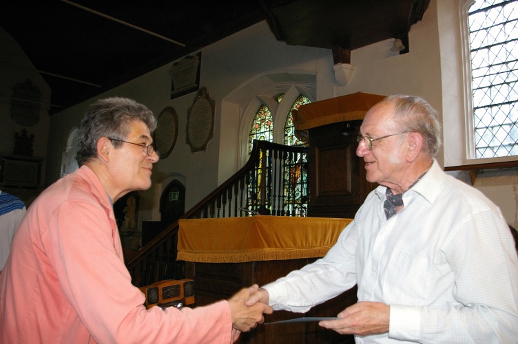 Clive Moore accepts second place certificate on behalf of Sawbridgeworth